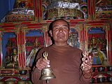 Tibet Kailash 07 Manasarovar 07 Trugo Gompa Monk holding Vajra and Bell A monk posed nicely for me at Trugo Gompa holding the important Buddhist symbols of a bell and a dorje (Skt. Vajra).